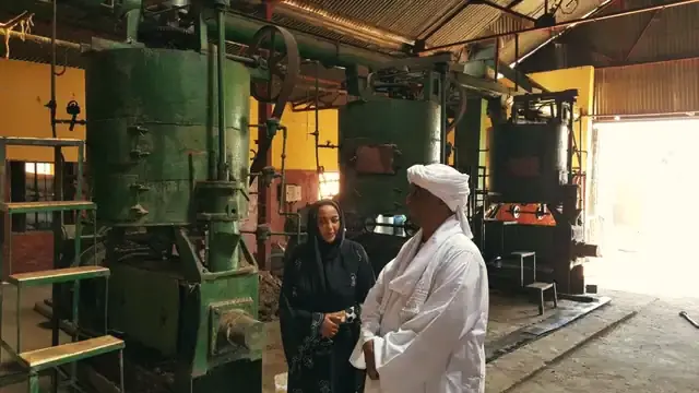 Ms. Samia Al Tayeb Al Khalifa Hassan on the floor of the Sennar mill